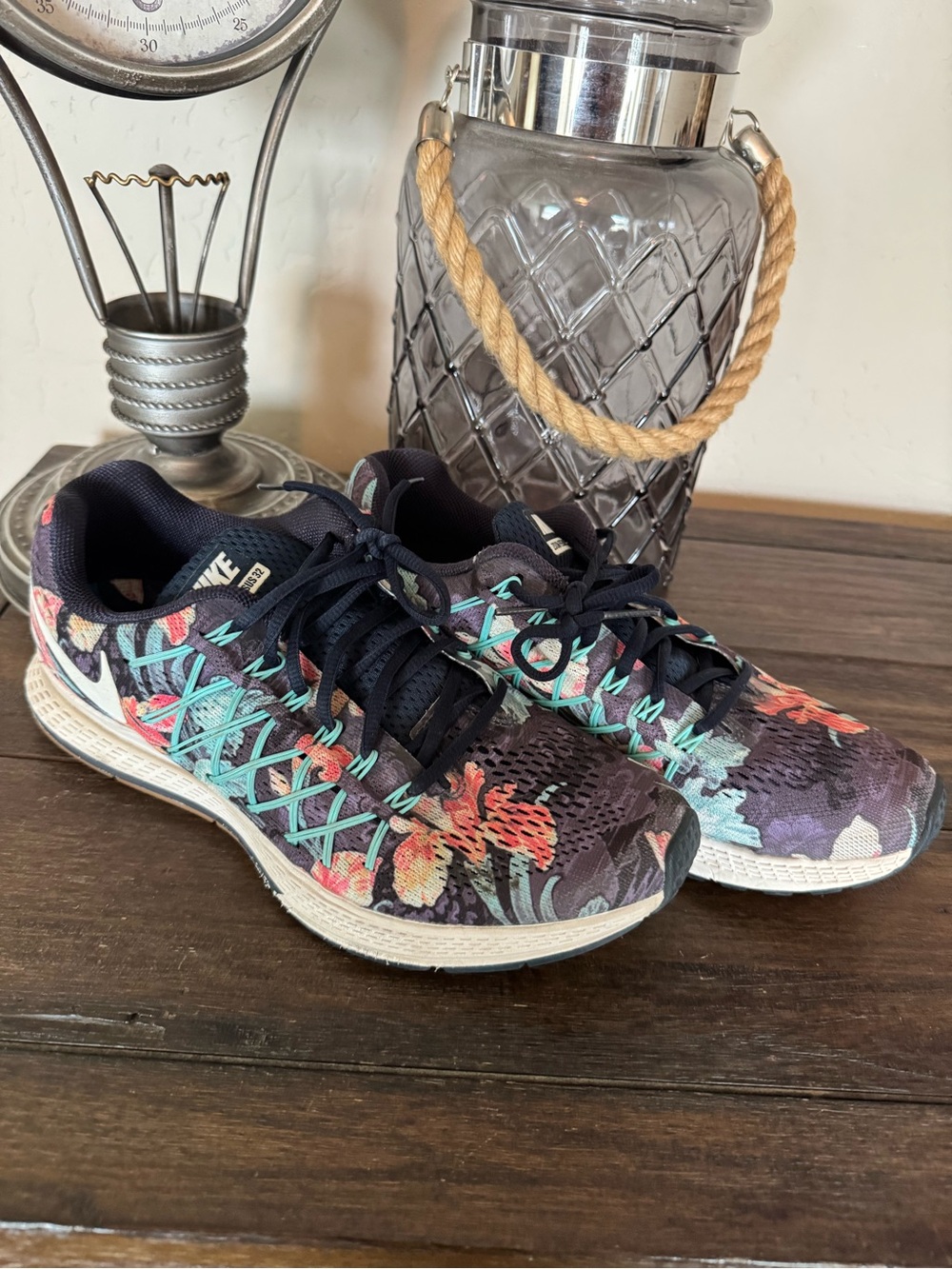 Nike Women's Black Athletic Shoes with Teal and Coral Floral Accents
